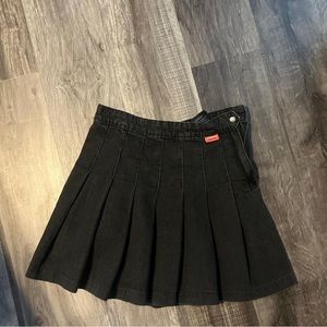 black pleated mini skirt